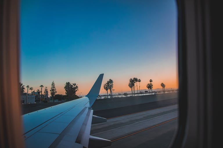 travel savings tips airplane window